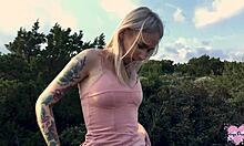 Sexy Russian teen enjoys outdoor masturbation with tattoos